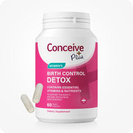 Conceive Plus Birth Control Cleanse supplement bottle for women, featuring 60 vegan capsules. The bold pink and white label highlights key benefits: supports the body’s natural detox from birth control and provides essential vitamins and nutrients. Two translucent capsules are shown beside the bottle. Dietary supplement for hormonal balance and reproductive wellness.