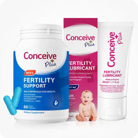 The image of Conceive Plus Men's Fertility Support Bundle on a white background. Image of Conceive Plus Men's Fertility Support bottle on the left side of the frame with two capsules out of the bottle on the lower left corner of the frame. Conceive Plus Fertility Lubricant Tube 30ml box on the right side of the frame and the tube of conceive Plus Fertility Lubricant on the extreme right of the frame.