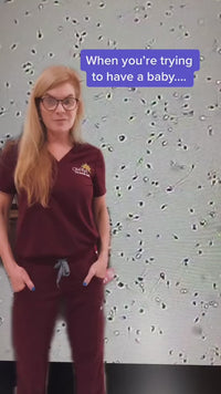 A video of a woman in doctor or nurse dress sharing tips for couples trying to conceive.