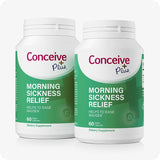 Two bottles of Conceive Plus Morning Sickness Relief displayed side by side featuring a green and white label with text that highlights product’s purpose: helps to ease nausea. Contains 60 vegan capsules. Designed as a dietary supplement to support pregnancy wellness.